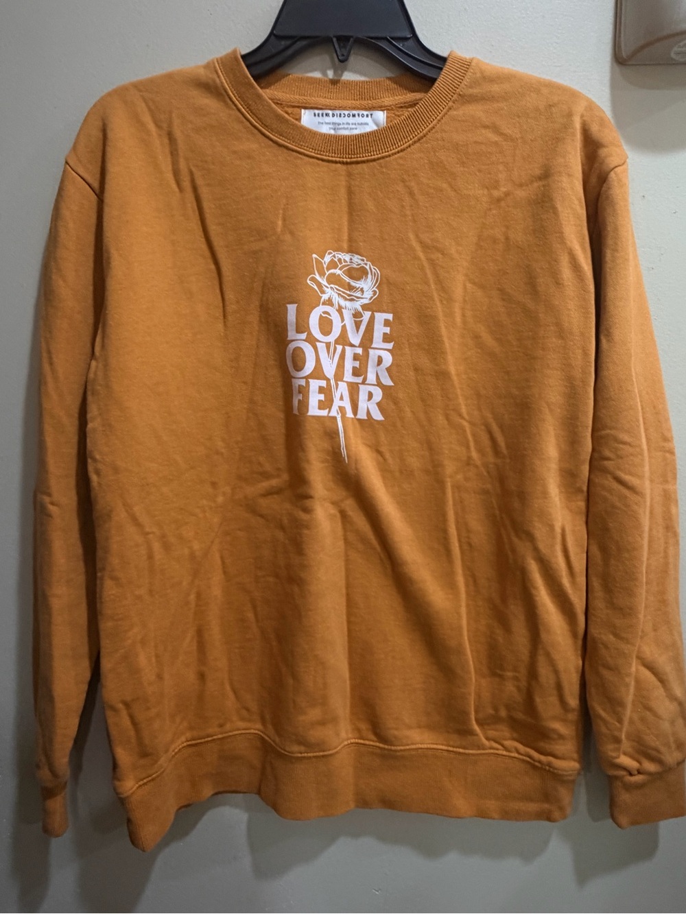 Seek Discomfort Organic Cotton Love Over Fear Graphic Sweatshirt - Mustard